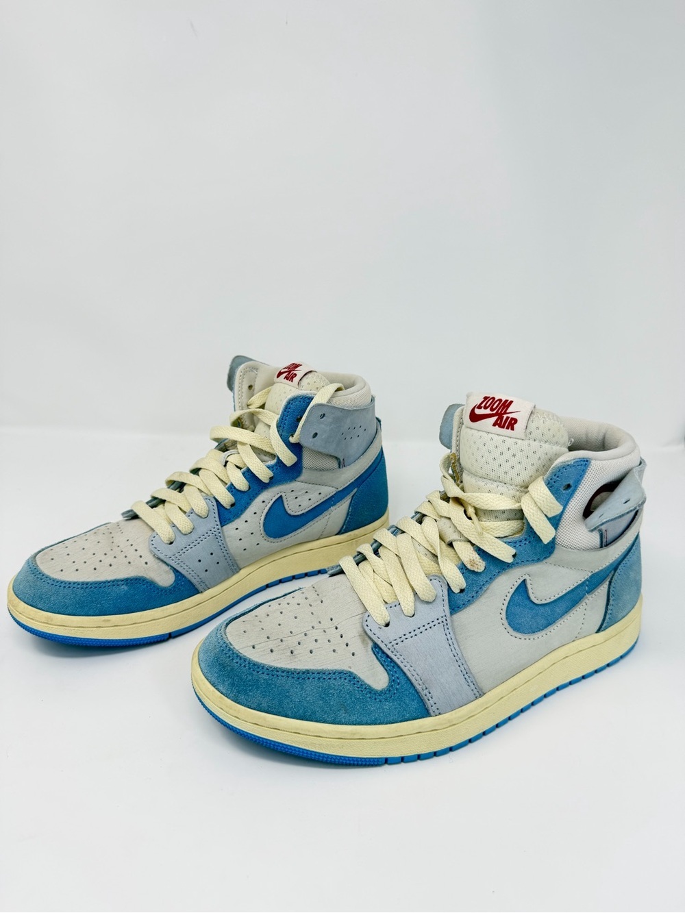 Nike High-Top Sneakers in Blue and Cream with Red Tongue Tag